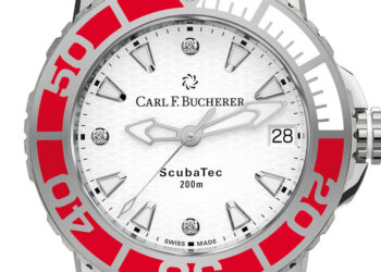 Das sorgfältig nissierte Zi erblatt mit Wellenstruktur ist mit drei Brillanten verziert. Zusätzlich zum weissen Kautschukarmband erhält der Kunde eine rote Variante, die jederzeit kostenlos bei einem Harmony-Servicecenter angebracht werden kann.