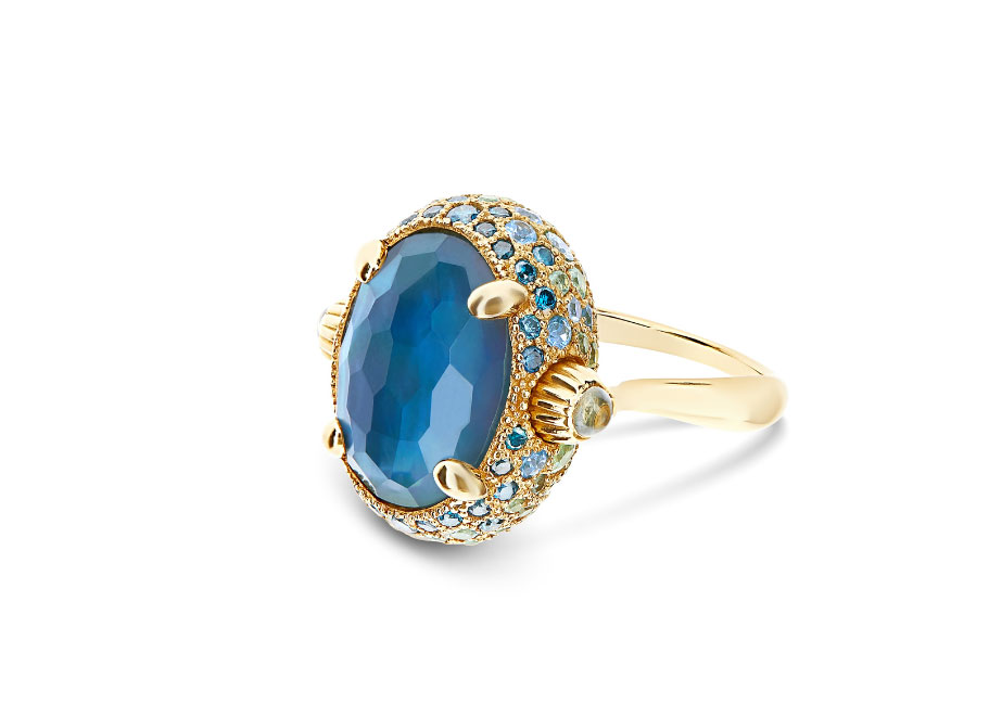 Ring "Dancing Reverse" aus 18 Karat Gold mit blauem Diamant, grünem Saphir, Swiss Blue Topas und Sky Blue Topas. © Nanis