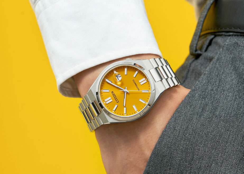 Trendig und in knalligen Farben: Uhr aus der "Citizen Me" Serie mit gelbem Ziffernblatt. © Citizen